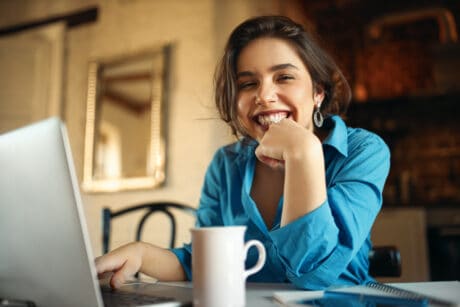 An entrepreneur reviewing her Hispanic small business loans applications.